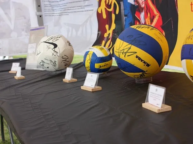 Signed volleyballs on display in the Silk Road Sports History Zone.